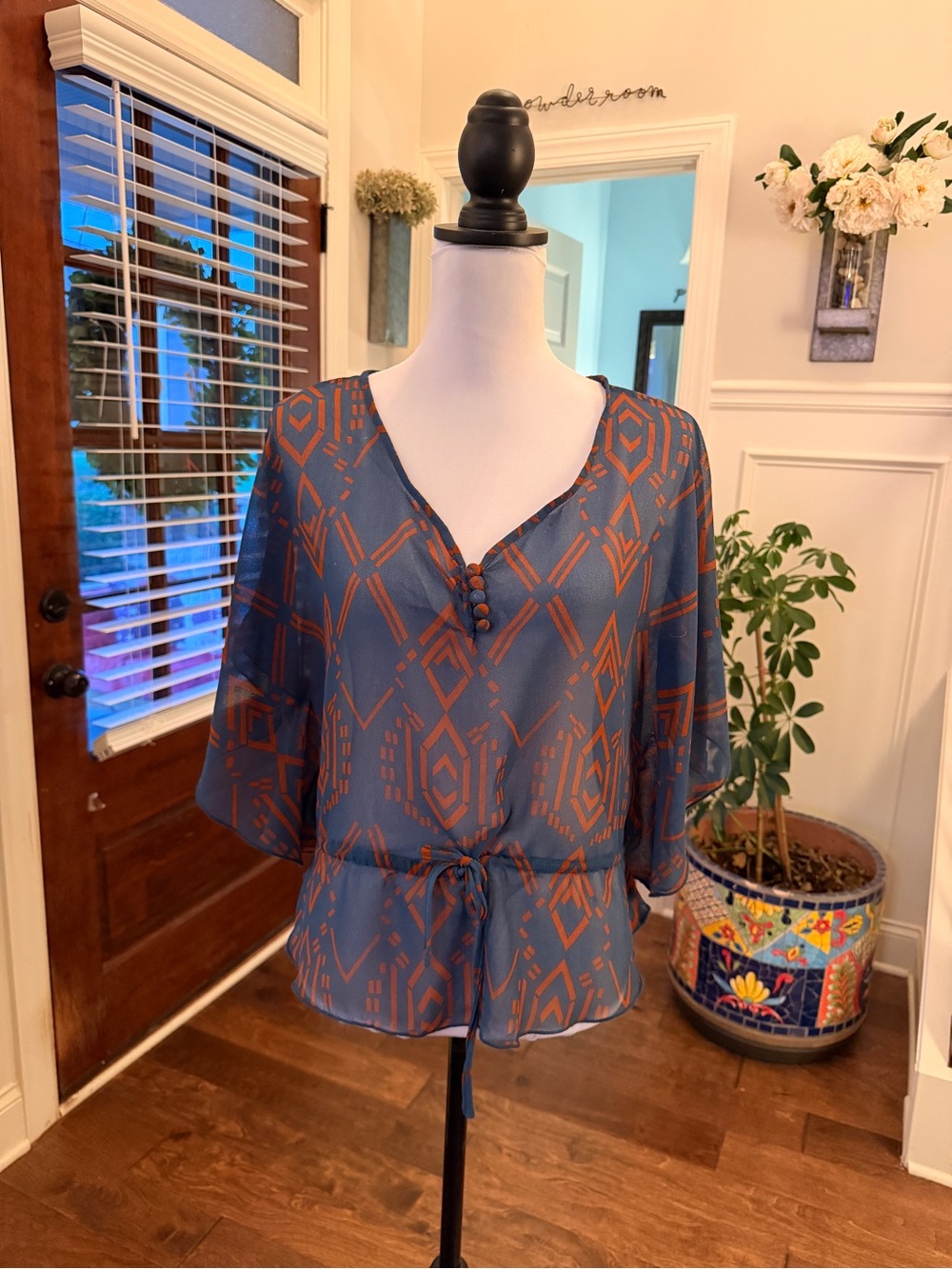 Angie NWOT Blue Geo-Print Dolman Sleeve Blouse with Tie Waist